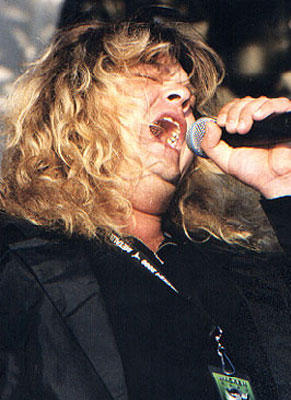 Zellweger Trying To Eat A Microphone At A Concert Last Monday